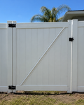 White pre-built vinyl privacy gate for a Jacksonville, FL fence
