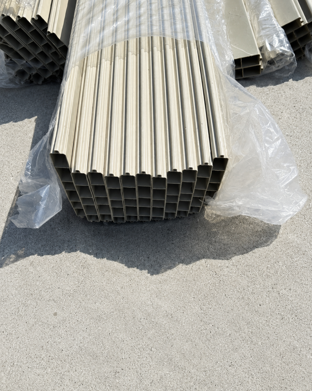 Tan vinyl privacy fence pickets, set of 11